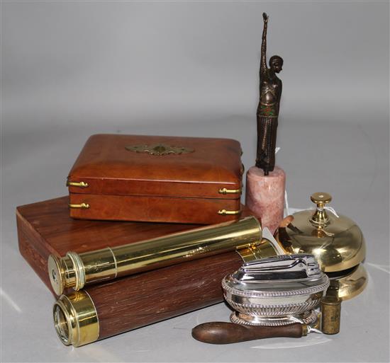 A small Art Deco style figure of a dancer, a brass table bell, two small boxes, a pocket telescope (a.f.), etc.